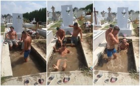Video // Mormânt transformat în piscină. Trei gropari s-au filmat pe TikTok în timp ce se răcoresc în cimitir